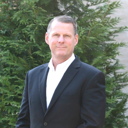 Headshot of John Siverling, Director of Private Markets and Impact Advocacy at OneAscent